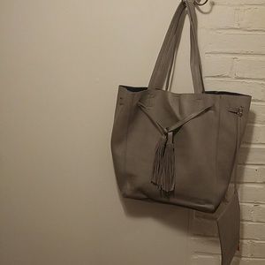 Izzy and Ali Gray tote with drawstring closure